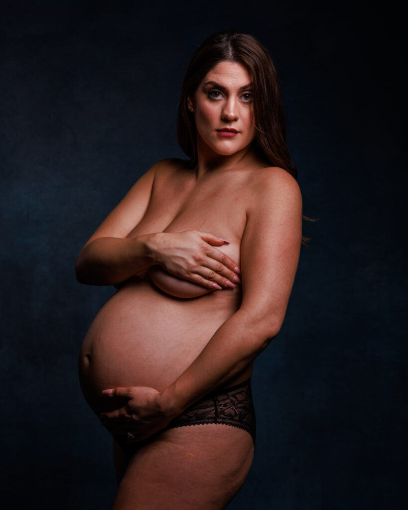 Elegant pregnancy portrait highlighting strength and motherhood
