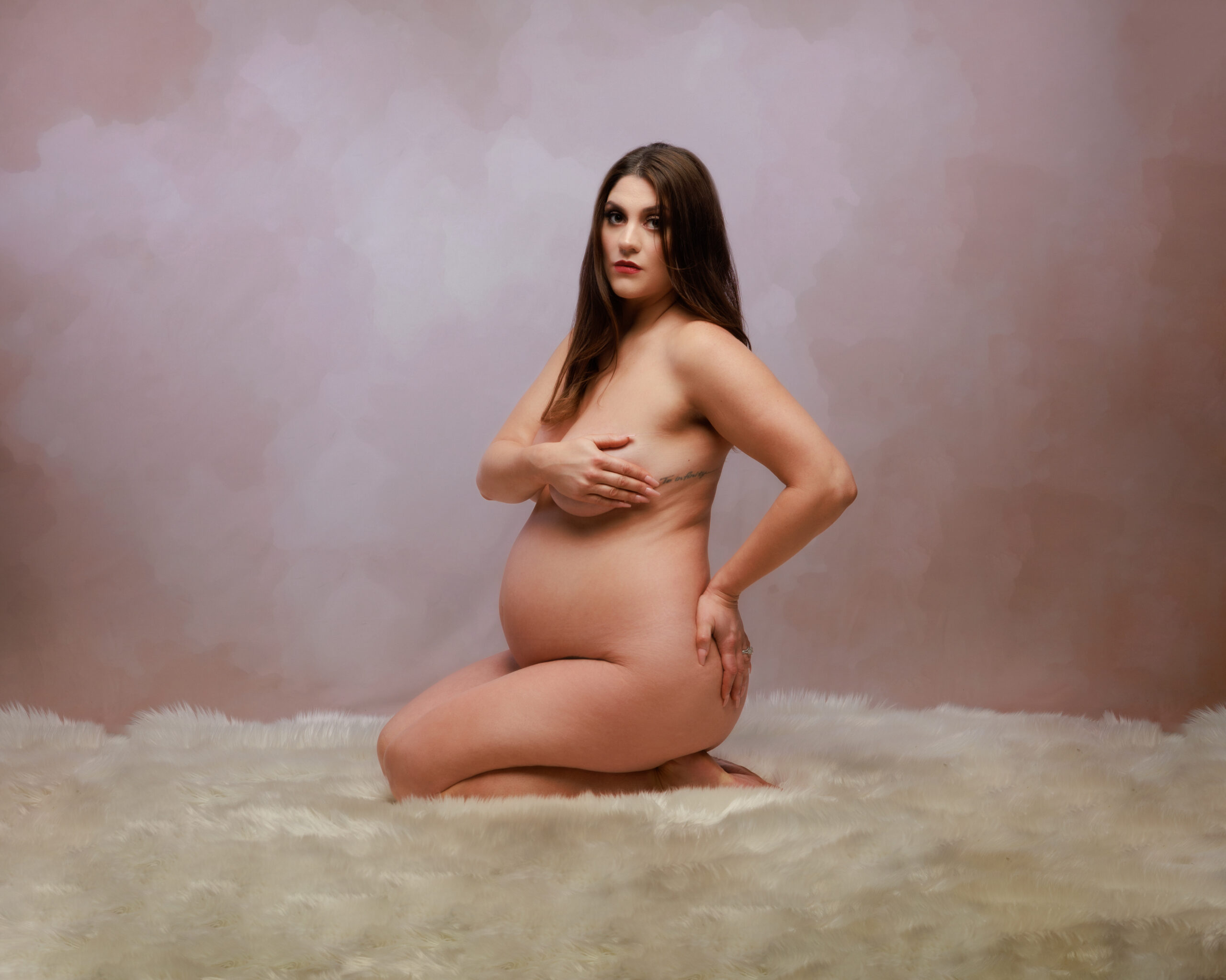 fine art maternity photography with dramatic shadows and curves
