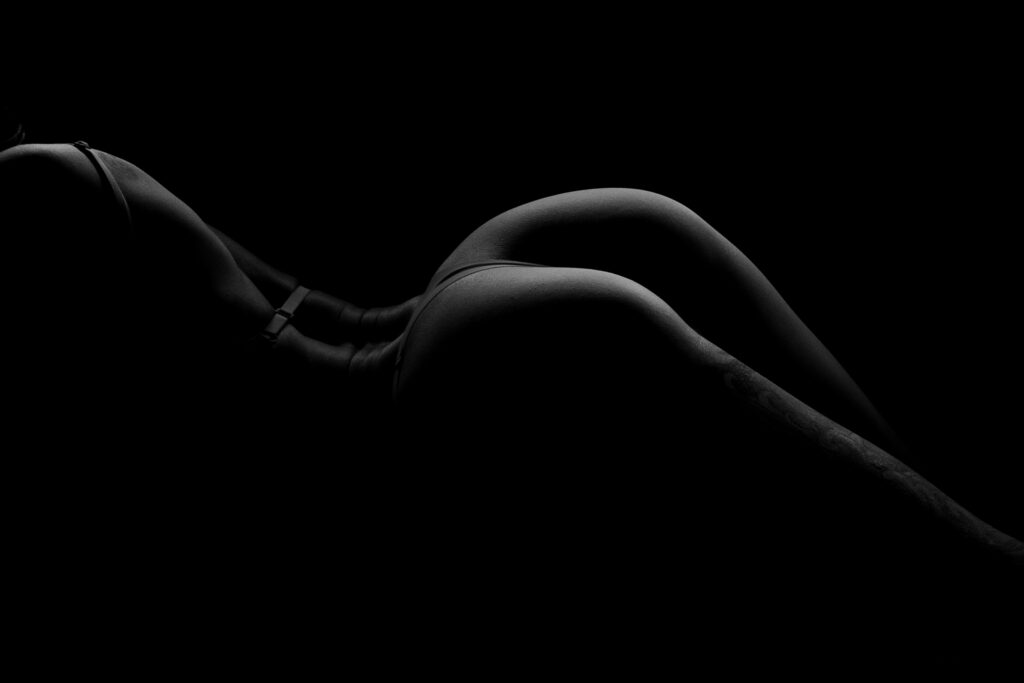 curvy body photography silhouette with dramatic lighting and body contours