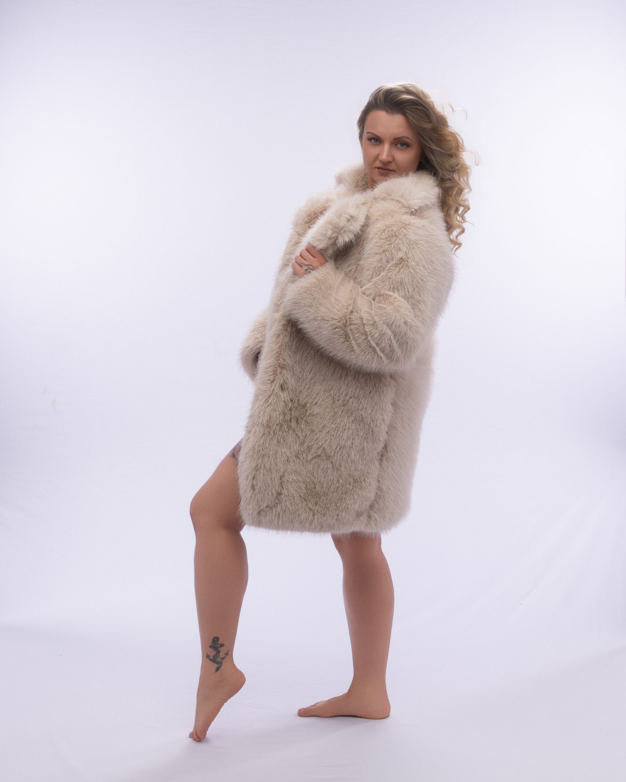 body positive boudoir portrait showcasing natural curves and confidence