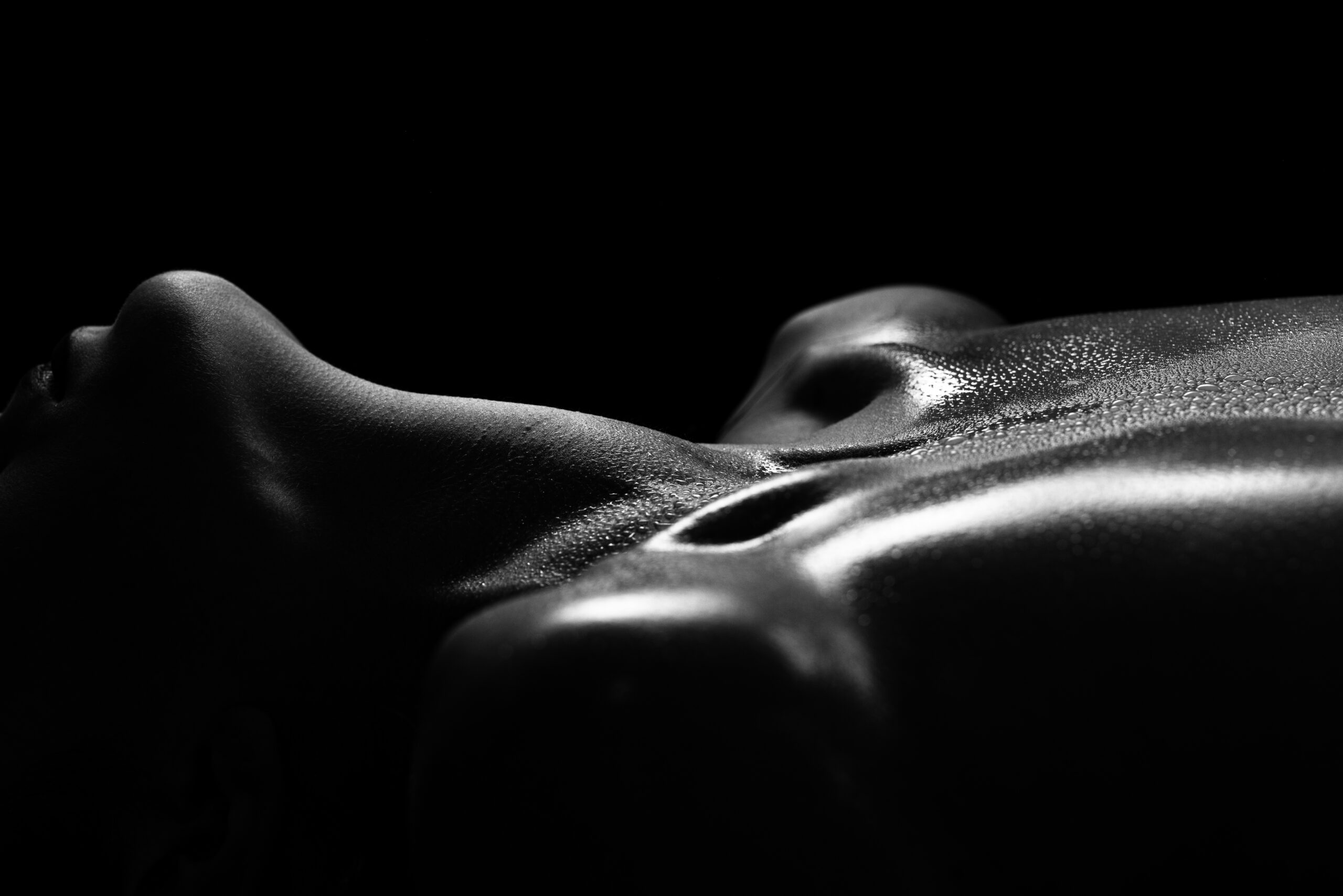 intimate body positive boudoir photography highlighting natural curves and light
