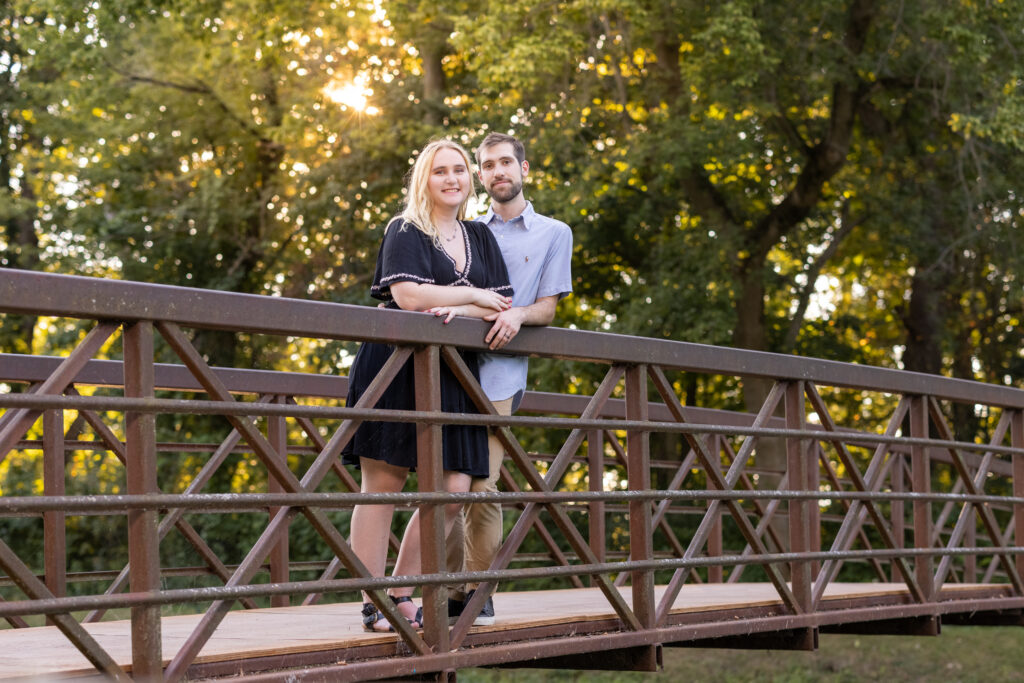 Family portrait on a stone bridge in Holcomb Gardens at Butler University