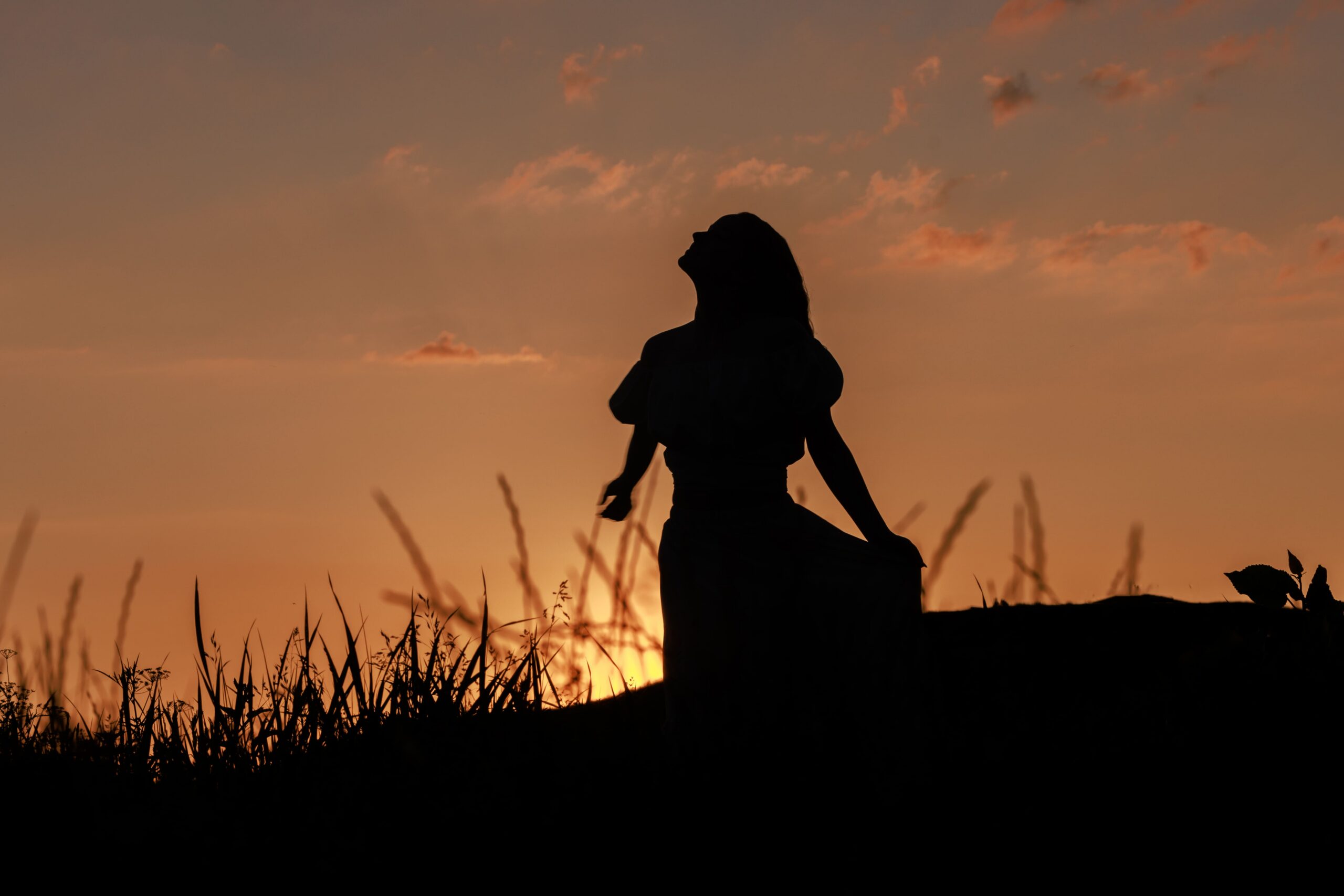 Senior portrait silhouette photography at sunset in Indianapolis field