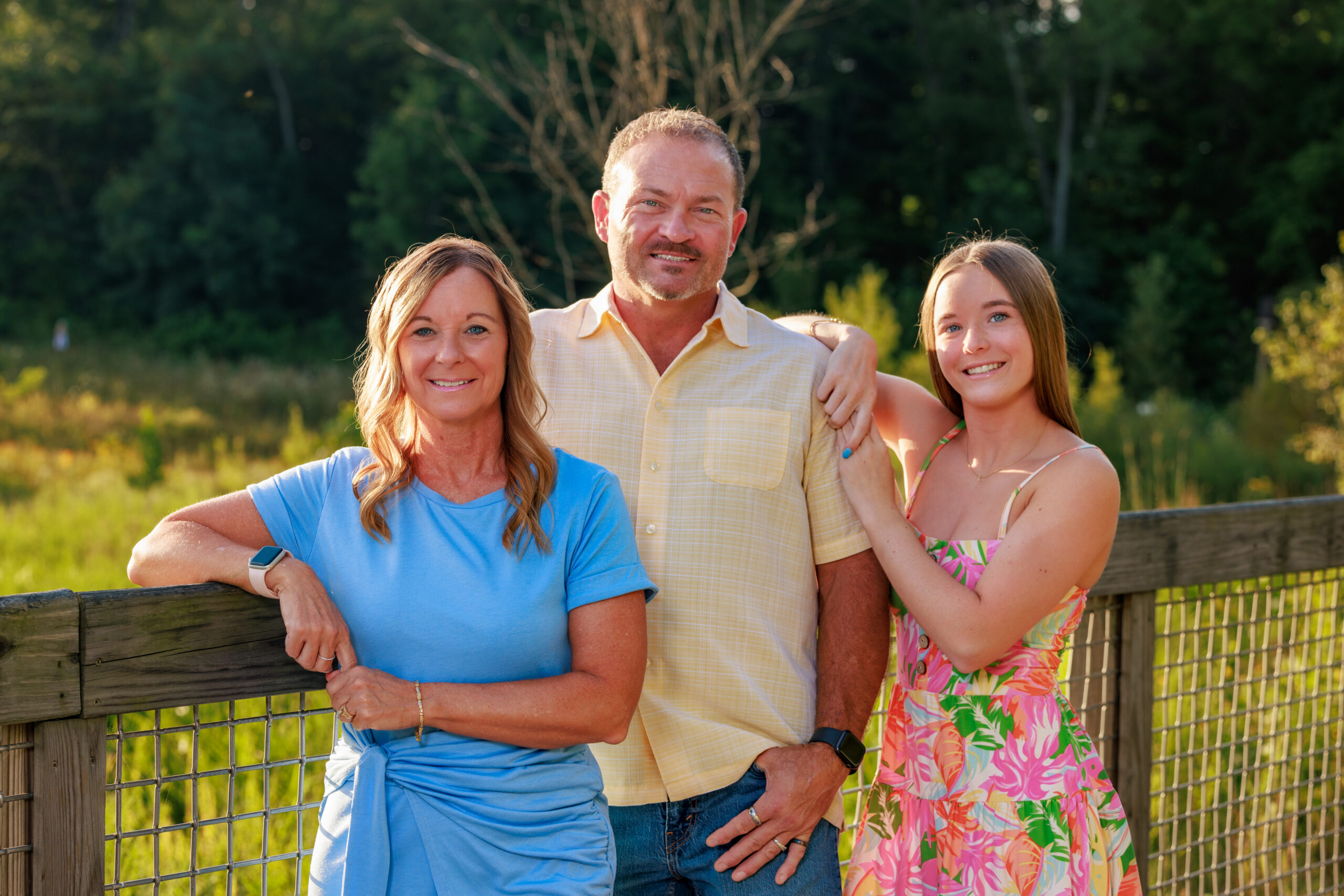 Family posing together at Flat Fork Creek Park, a top family photo location in Indianapolis