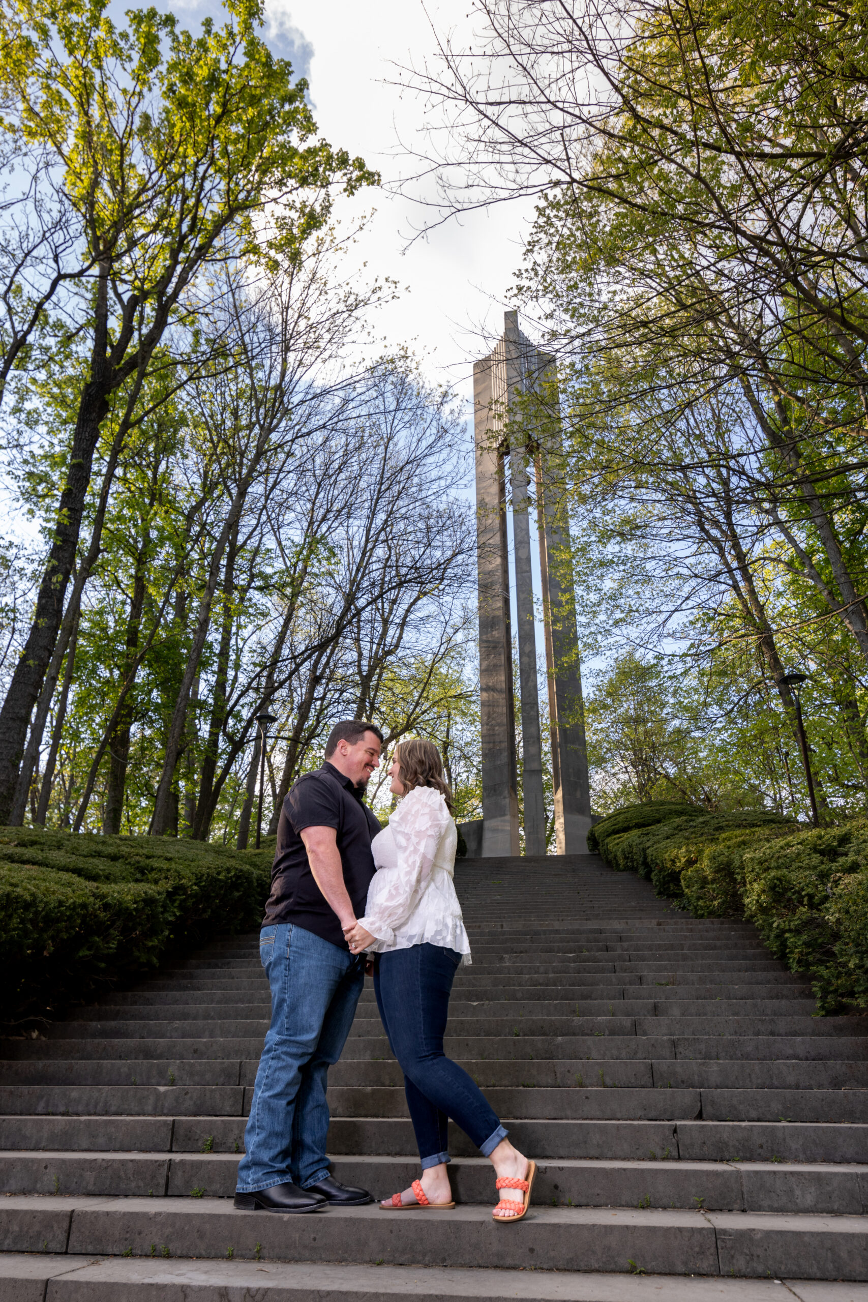 A couple on steps at Holcomb Gardens on Butler University, a top family photo location in Indianapolis