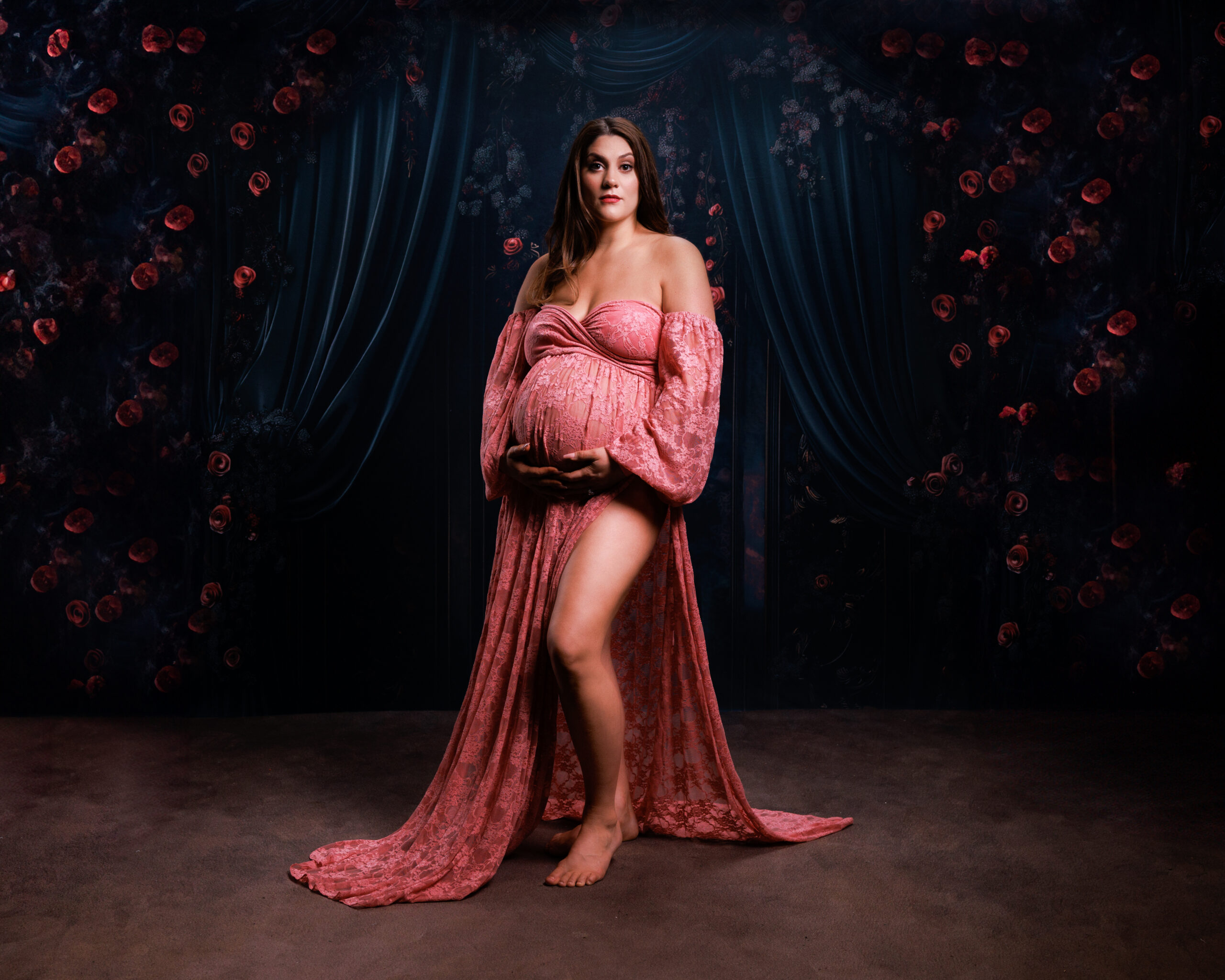 Pregnant woman in lace gown, artistic maternity portrait from a grow with me photography package