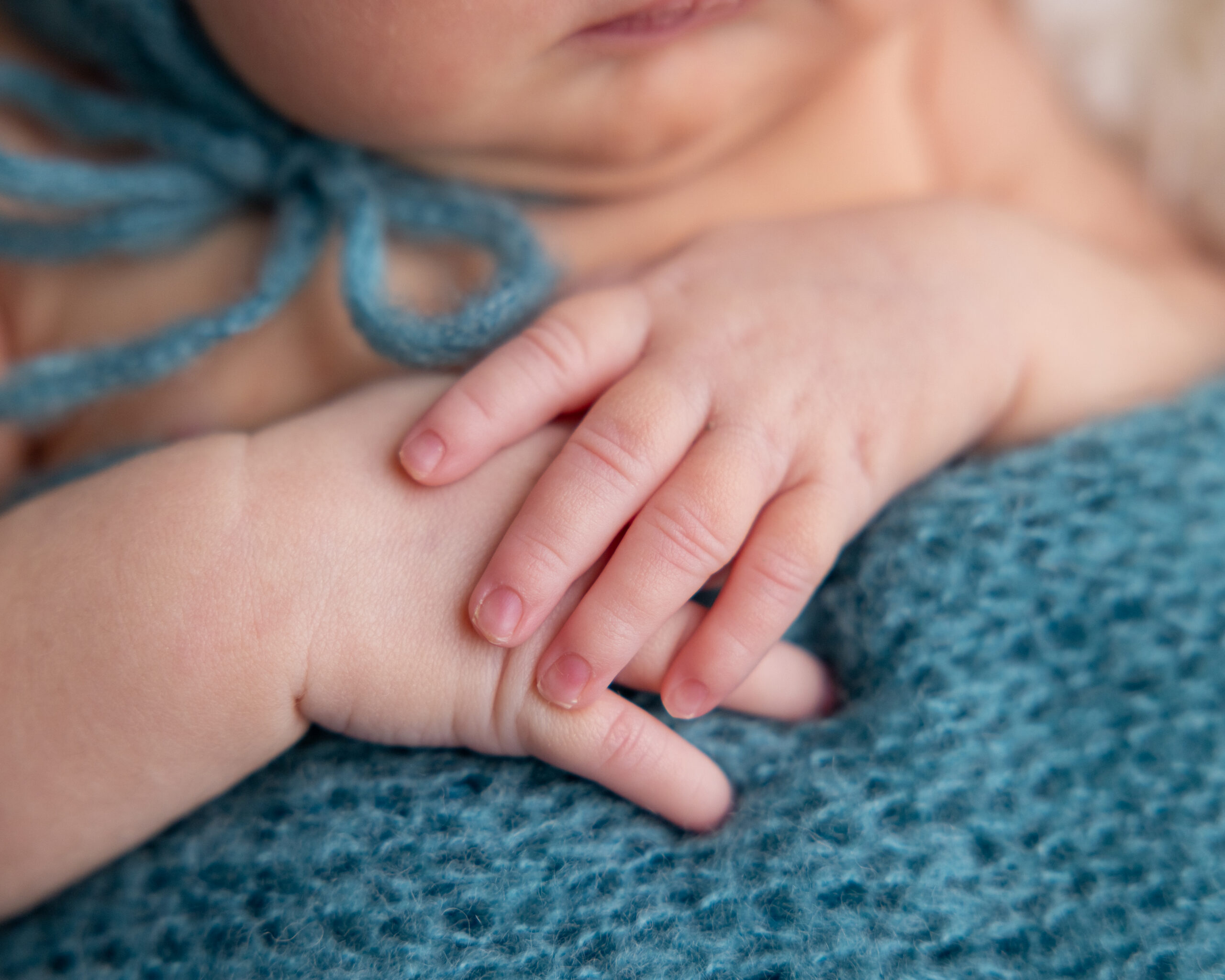 Close up of newborn baby's hand 