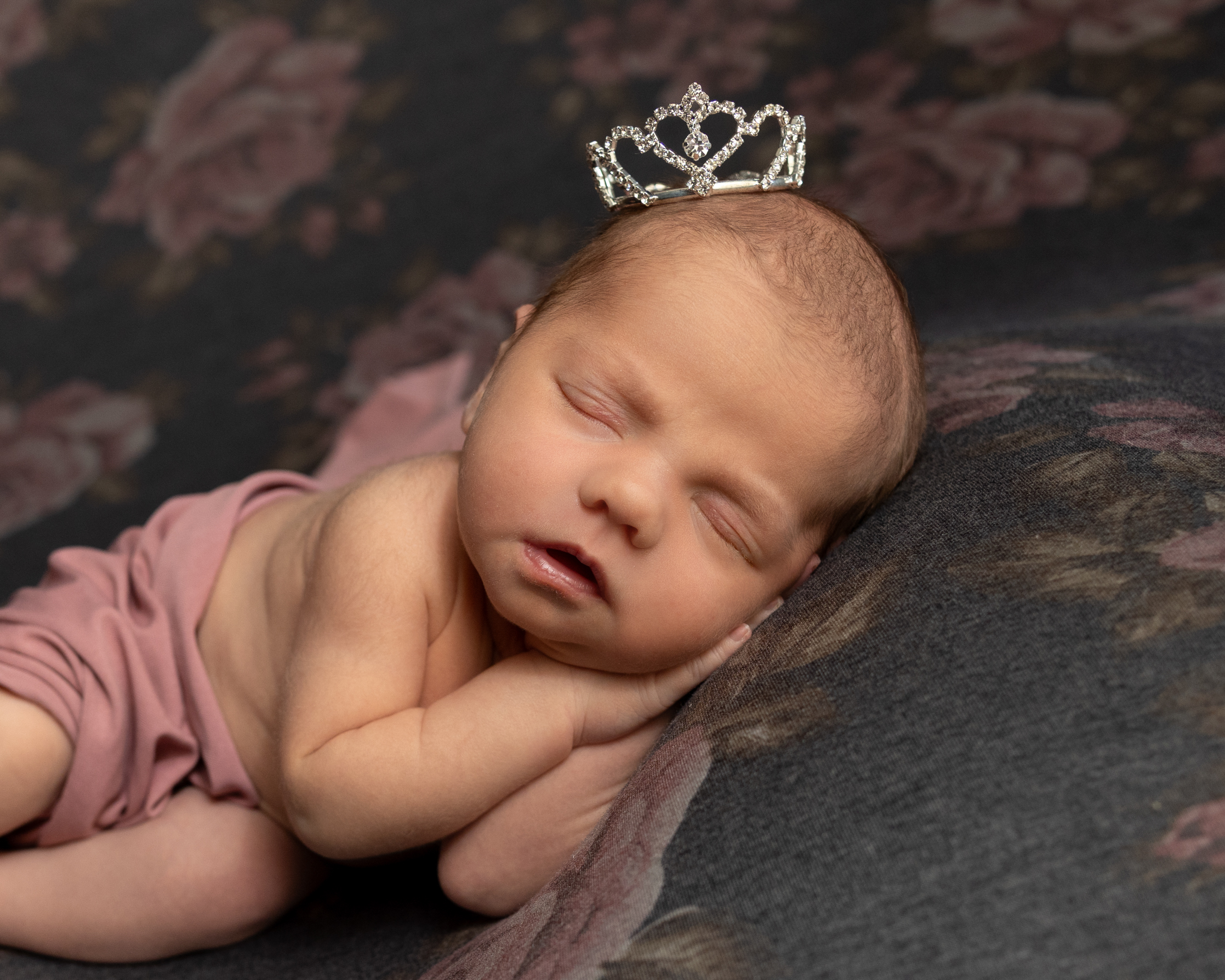 Sleeping newborn wearing tiny tiara, grow with me photography package newborn portrait